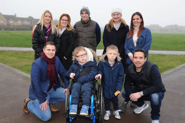 Three Peaks fundraising charity walkers for three children with disabilities front L-R Matt Smith, twins Reuben and Zach Smith, Tim Langley. Back L-R Donna Armstrong, Heidi Guerrier, George Armstrong, Alexia Daniels, Kyla Smith.
Picture: Paul Jacobs (160121-2)