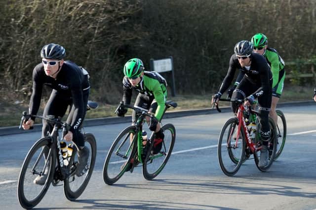 Joe Fry's Pedal Heaven team-mates Mitch Webber, second left, and Rory Townsend, right, in action during last season's Perfs Pedal. Picture: Allan Hutchings (150213-673)