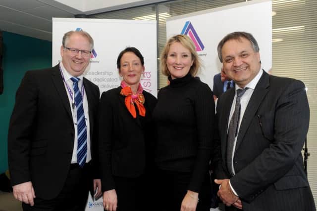 From left, Nigel Duncan, principal of Fareham College, Claire Froggatt, director of the Solent Leadership Academy, Caroline Dinenage, MP for Gosport and Marinos Paphitis, chairman of Fareport Training Organisation
Picture: Sarah Standing (160166-1547)
