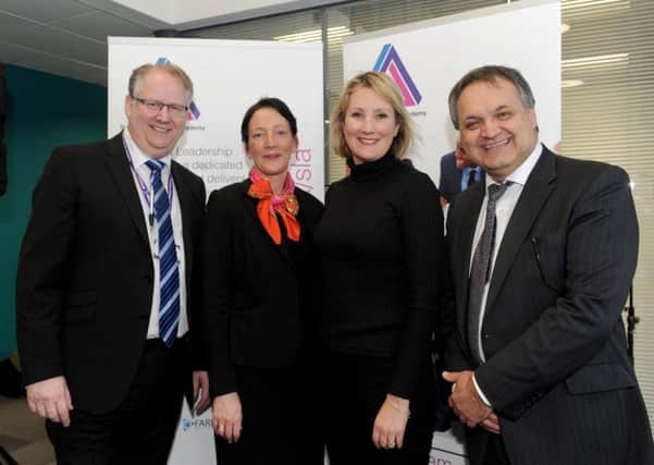 From left, Nigel Duncan, principal of Fareham College, Claire Froggatt, director of the Solent Leadership Academy, Caroline Dinenage, MP for Gosport and Marinos Paphitis, chairman of Fareport Training Organisation 

Picture: Sarah Standing (160166-1547)
