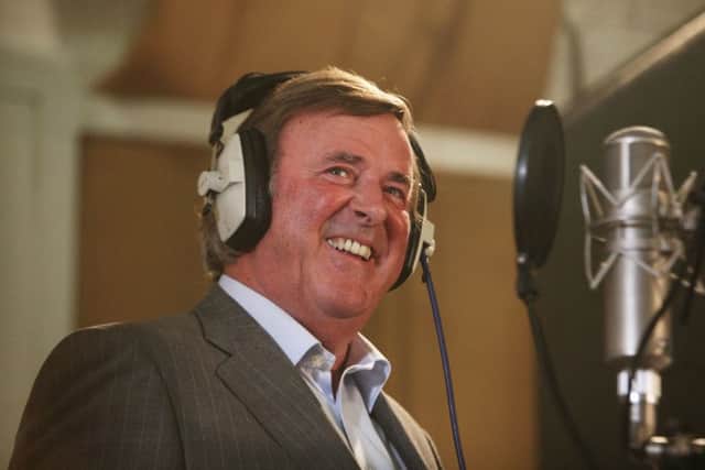 Sir Terry Wogan recording a track for Children in Need at Abbey Road studios in London. Picture: Katie Collins/PA Wire