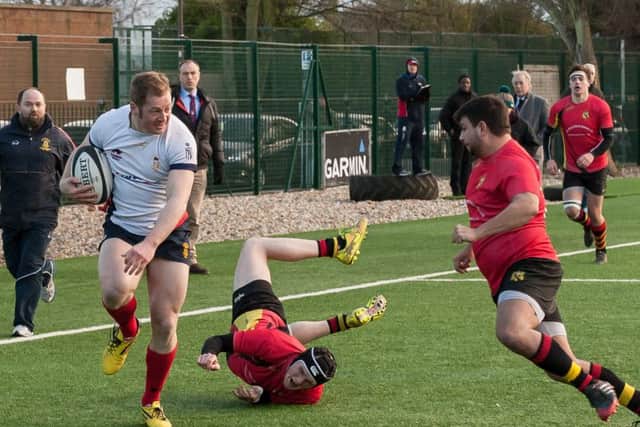 Luke Peters on the charge to score a try for US against Eastleigh. Picture: Keith Woodland