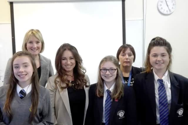Students from Bridgemary School and Brune Park School with Gosport MP Caroline Dinenage, chief executive of Ann Summers Jacqueline Gold and Bridgemary headteacher Vicky White.Picture: Ellie Pilmoor
