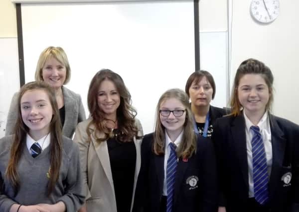 Students from Bridgemary School and Brune Park School with Gosport MP Caroline Dinenage, chief executive of Ann Summers Jacqueline Gold and Bridgemary headteacher Vicky White.

Picture: Ellie Pilmoor