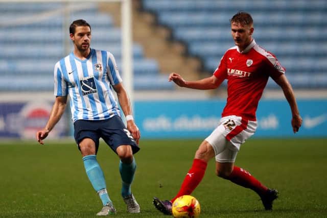 Michael Smith, right, in action during his loan spell at Barnsley