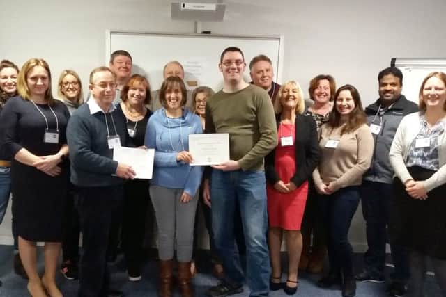 TOAST Wendy Benson and Keith Oliver celebrate receiving their Silver and Gold Awards with Spinnaker Speakers
