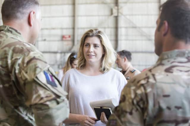 Penny Mordaunt MP talking to personnel at 903 Expeditionary Air Wing (EAW) PHOTO: MoD