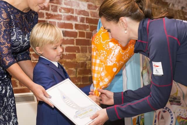 Leo Howard showing the Duchess of Cambridge his winning design last year Picture: Lloyd Images