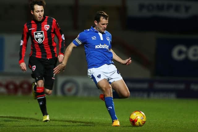 Michael Doyle on the ball in front of a crowd of just 1,399 at the Globe Arena. Picture: Joe Pepler