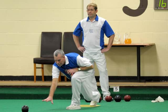 Greg Harlow watches Paul Bennett bowl. Picture: Paul Jacobs (160131-17)