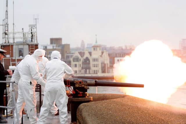 A 21-gun salute will be fired by the Royal Navy on Saturday to mark the 64th anniversary of the Queens accession to the throne