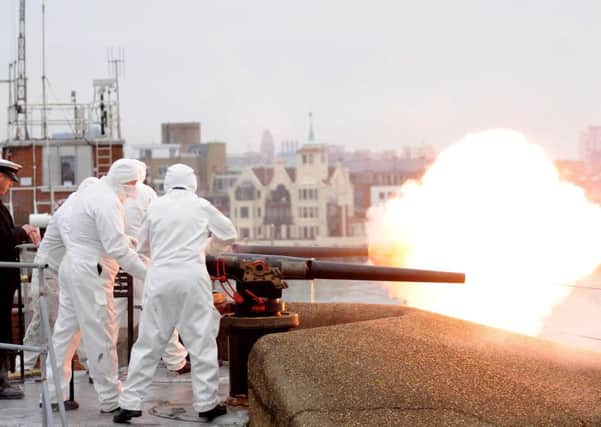 A 21-gun salute will be fired by the Royal Navy on Saturday to mark the 64th anniversary of the Queens accession to the throne