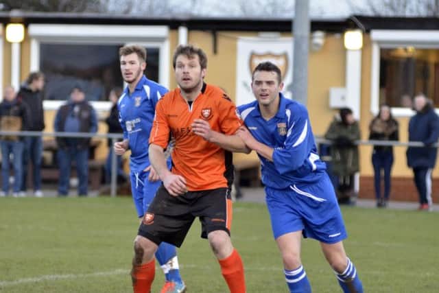 AFC Portchester midfielder Craig Hardy, centre    Picture: Neil Marshall
