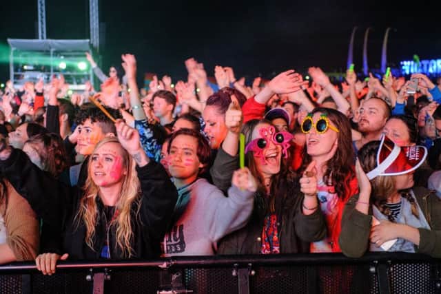 Music fans enjoy Tinie Tempah performing on the Castle Stage at the 2015 Victorious Festival. Picture: Allan Hutchings
