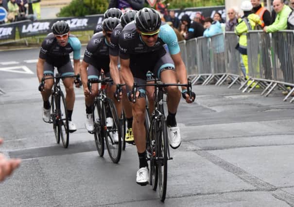 Marcin Bialoblocki leads ONE Pro Cycling up the Union Street climb during their team time trial at last summer's Tour Series event in Ryde. Picture: Larry Hickmott