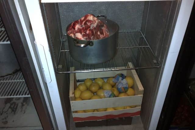 Raw meat stored on top of ready-to-eat food