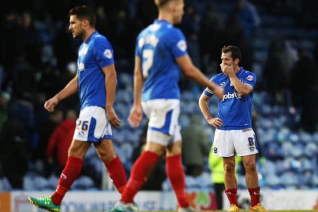 Pompey skipper Michael Doyle cuts a disconsolate figure following the Blues' 1-0 home loss to Leyton Orient      Picture: Joe Pepler