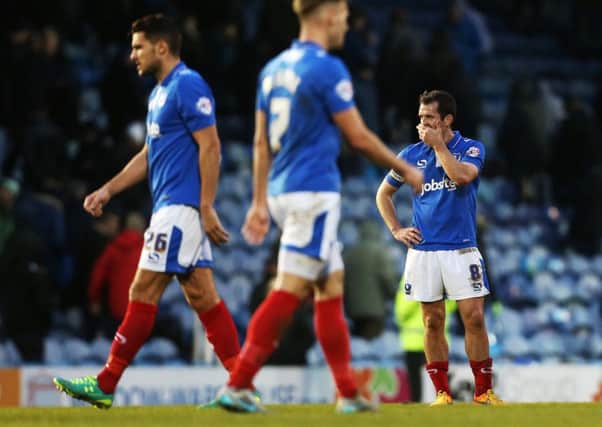 Pompey skipper Michael Doyle cuts a disconsolate figure following the Blues' 1-0 home loss to Leyton Orient      Picture: Joe Pepler