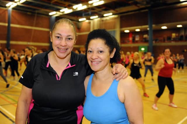 Julie Brathwaite (53) and Paula McLean (49), sisters of Alison Morrison, who was murdered in 2014, at the body combat event at the Mounbatten Centre
Picture by:  Malcolm Wells (160207-7735)