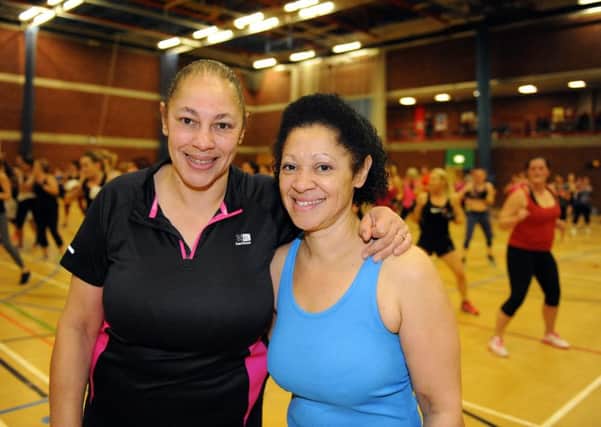 Julie Brathwaite (53) and Paula McLean (49), sisters of Alison Morrison, who was murdered in 2014, at the body combat event at the Mounbatten Centre

Picture by:  Malcolm Wells (160207-7735)