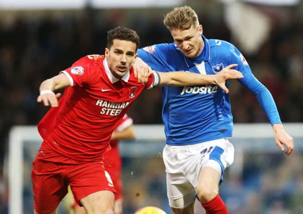 Michael Smith, right, made his Fratton Park debut on Saturday in a 4-4-2 formation Picture: Joe Pepler