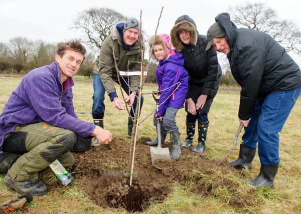 From left,  tree consultant Michael Reed, Tim Beasley, Grace Beasley, Phyllis Coleman and Brian Coleman planting trees in Emsworth

Picture: Allan Hutchings (160144-173)