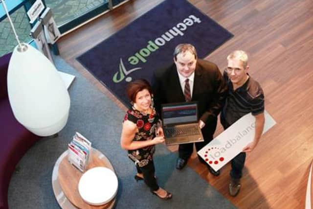 Loadbalancer.org's husband-and-wife team Malcolm Turnbull, far right, and Karen Turnbull with Peter Outen, centre manager at Portsmouth Technopole