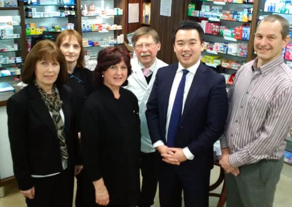 Alan Mak MP with Keith Seston and staff at Davies Pharmacy in Havant