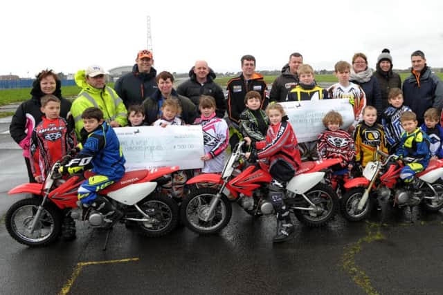 Tigers Motorcycle Display Team donate Â£500 to the Elizabeth Foundation. Picture: Paul Jacobs (160129-2)