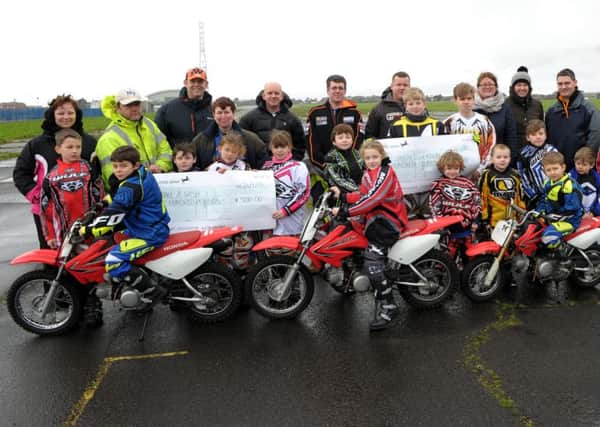 Tigers Motorcycle Display Team donate Â£500 to the Elizabeth Foundation. 

Picture: Paul Jacobs (160129-2)