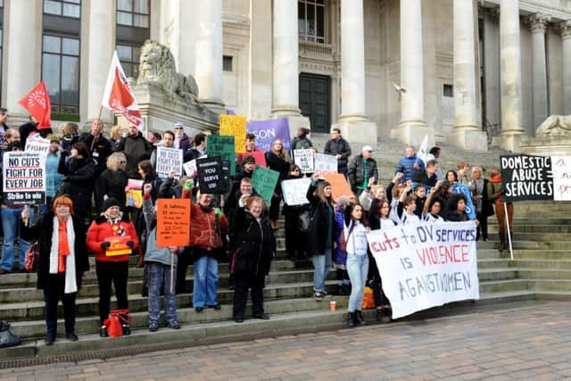 Anti-domestic violence campaigners staged a protest in Guildhall Square ahead of a meeting of the full council
