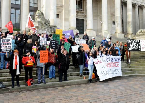 Anti-domestic violence campaigners staged a protest in Guildhall Square ahead of a meeting of the full council
