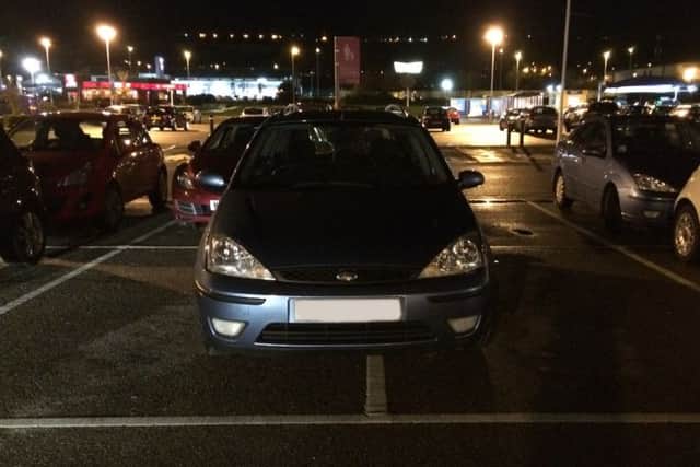 A car stradding two spaces at Tesco on North Harbour, Portsmouth