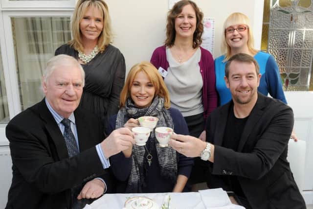 Back from left, community fundraiser Heidi Rehman, centre manager Marian Parfitt and fundraising manager Sally Hillyear with, front from left, former Saints manager Lawrie McMenemy, actress Sarah Parish and ex-Liverpool, Wales and Southampton goalkeeper Paul Jones Picture: Sarah Standing (160326-3158)