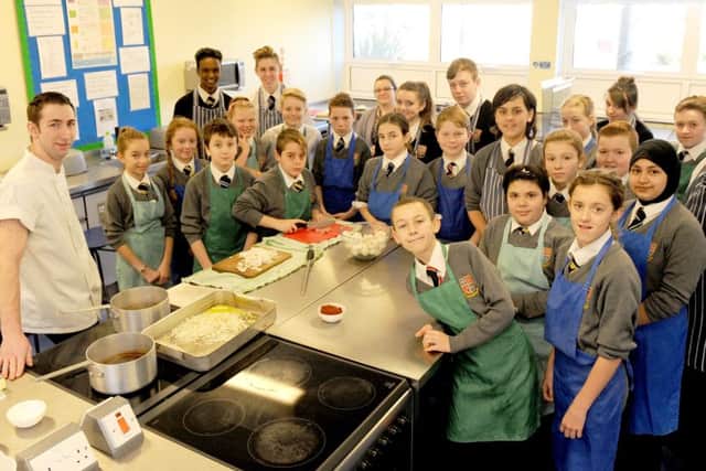 Matt Hewitt, the head chef at The Bakers Arms in Droxford, returned to his former school, Brune Park in Gosport, to hold a workshop for childre Picture: Sarah Standing (160323-2938)