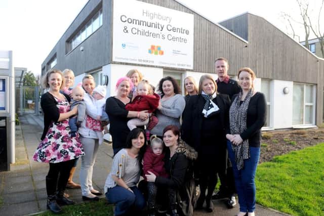 Right, Donna Jones, leader of Portsmouth City Council with Jim Fleming, standing for election in Cosham and Hannah Hockaday, councillor for Cosham, with parents, children and volunteers at the Highbury Community and Children's Centre Picture: Sarah Standing (160207-2061)