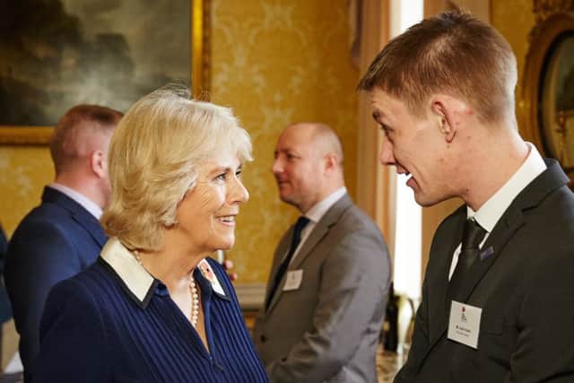 Southsea navy veteran Justin Heath meets the Duchess of Cornwall at a celebration of the work of The Poppy Factory Picture: Oliver Rudkin
