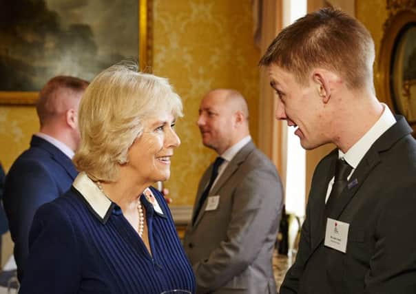 Southsea navy veteran Justin Heath meets the Duchess of Cornwall at a celebration of the work of The Poppy Factory 

Picture: Oliver Rudkin