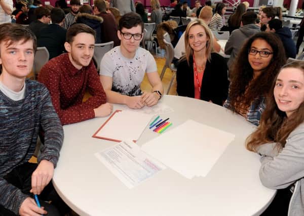 Charleine Wain with students, from left, Angus Kane, 18, Reece Matthews, 17, Lewis Hayes, 17, Nabila Naushad, 16, and Nicole Badger, 17
Picture: Sarah Standing (160325-3128)