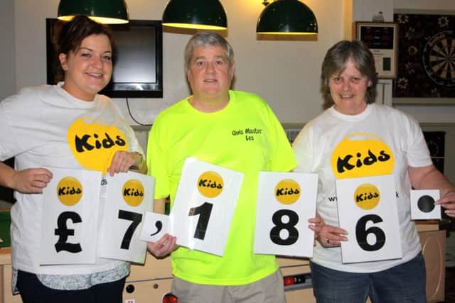 COMMITTED KIDS charity fundraiser Kitty McMonagle with Les Heyhoe and his wife Lyn