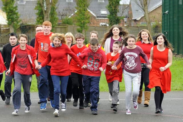 Year 9 pupils at Glenwood School in Washington Road, Emsworth, took part in Ruby Red Day Picture: Malcolm Wells (160212-6388)