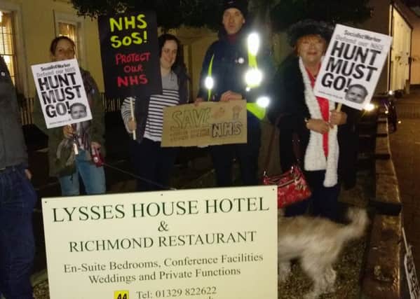 Protesters gathered outside the Lysses Hotel in Fareham in case health secretary Jeremy Hunt turned up - but the drinks party was cancelled 

Picture: Jon Woods