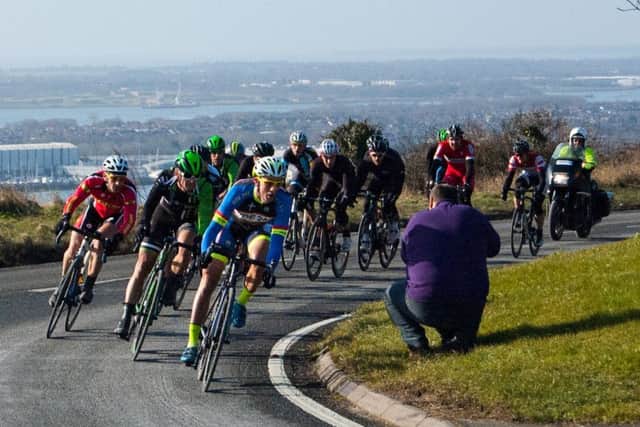 The peloton crests the Portsdown Hill climb before descending to Southwick in the 2015 Perfs Pedal. Picture: Rob Atkins