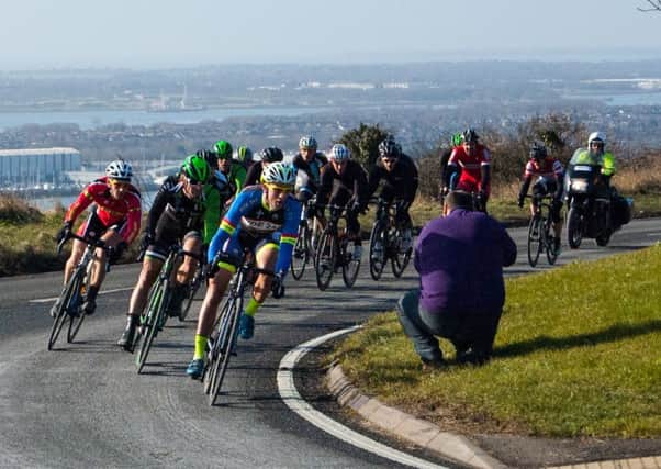 The peloton crests the Portsdown Hill climb before descending to Southwick in the 2015 Perfs Pedal. Picture: Rob Atkins
