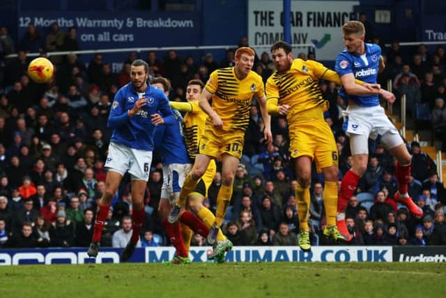 Michael Smith opens his scoring account for Pompey Picture: Joe Pepler