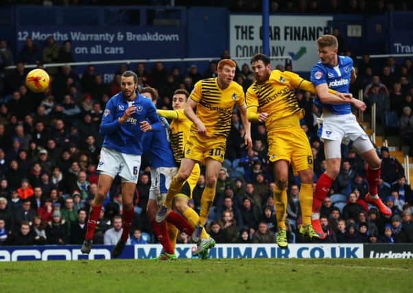 Michael Smith opens his scoring account for Pompey Picture: Joe Pepler