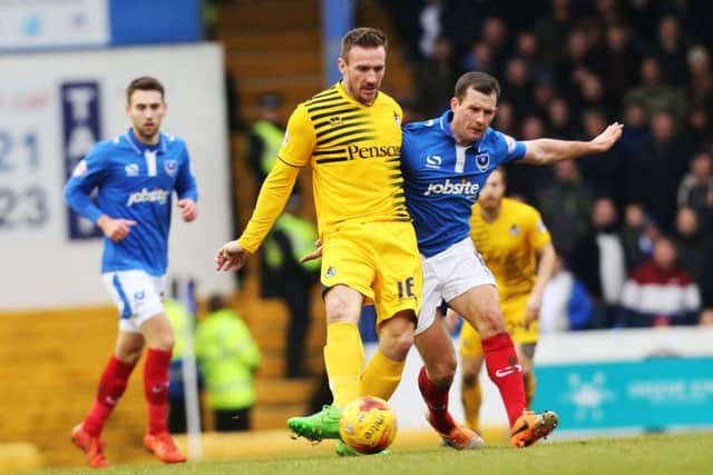 Michael Doyle battles for the ball against Bristol Rovers. Picture: Joe Pepler