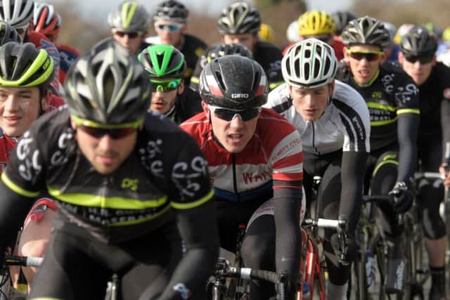 A VC St Raphael rider, centre, during the second lap of Portsdown Hill. Picture: Mick Young (160187-07)