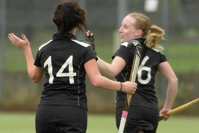 Hannah Oldham, right, scored twice