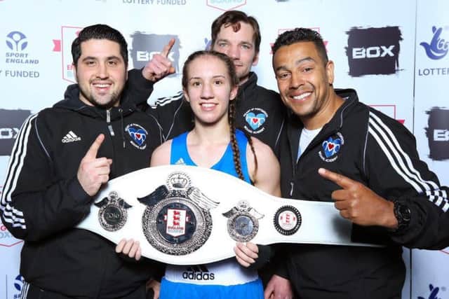 Ivy-Jane Smith, centre, with Heart of Portsmouth coaches, from left, Paul Kapnisi, Colin Brown and Q Shillingford